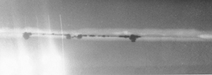 Image of a radiograph showing pits, associated with a lack of full weld penetration, which act as crevices.